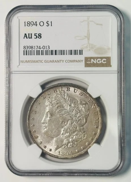 1894 New Orleans Morgan dollar NGC AU 58 silver: 1894 New Orleans Morgan dollar NGC AU 58 silver This 1894 Morgan Silver Dollar was minted in New Orleans and is graded AU-58 by NGC. Composed of silver, this pre-owned coin is a collectible piece from