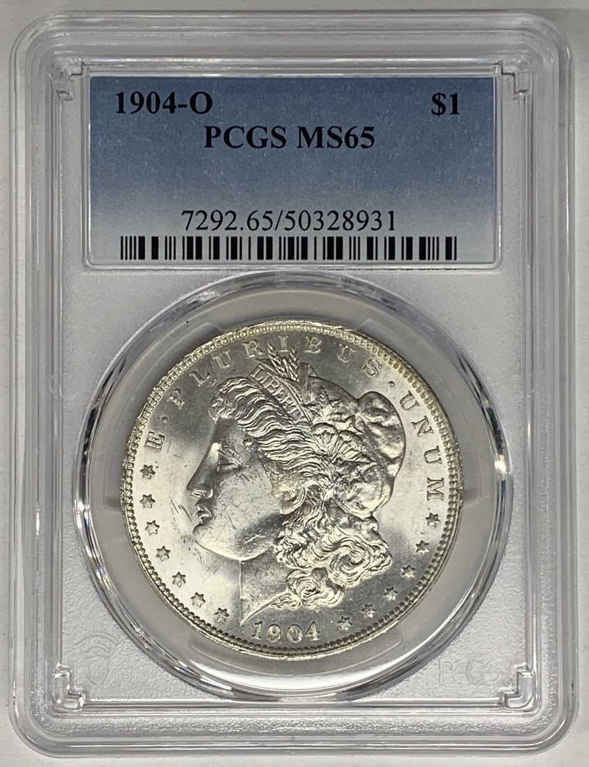 PCGS MS 65 1904-O Silver Morgan Dollar Uncirculated $1 Coin: PCGS MS 65 1904-O Silver Morgan Dollar Uncirculated $1 Coin This is a 1904-O Morgan Silver Dollar coin from the United States, certified by PCGS with a grade of MS 65. The coin is uncirculated and has