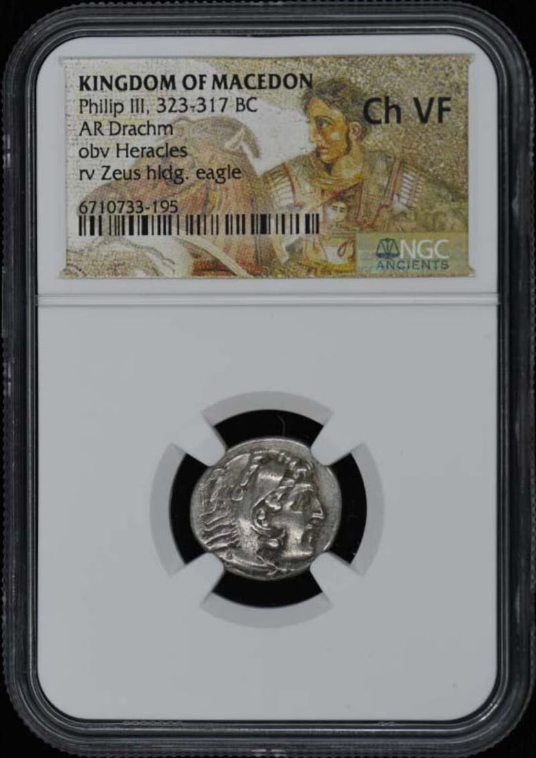 NGC VF30 Macedon Silver Drachm Philip III: NGC VF30 Macedon Silver Drachm Philip III This is an ancient silver drachm coin from the Kingdom of Macedon, issued during the reign of Philip III between 323 and 317 BC. The coin has been certified a