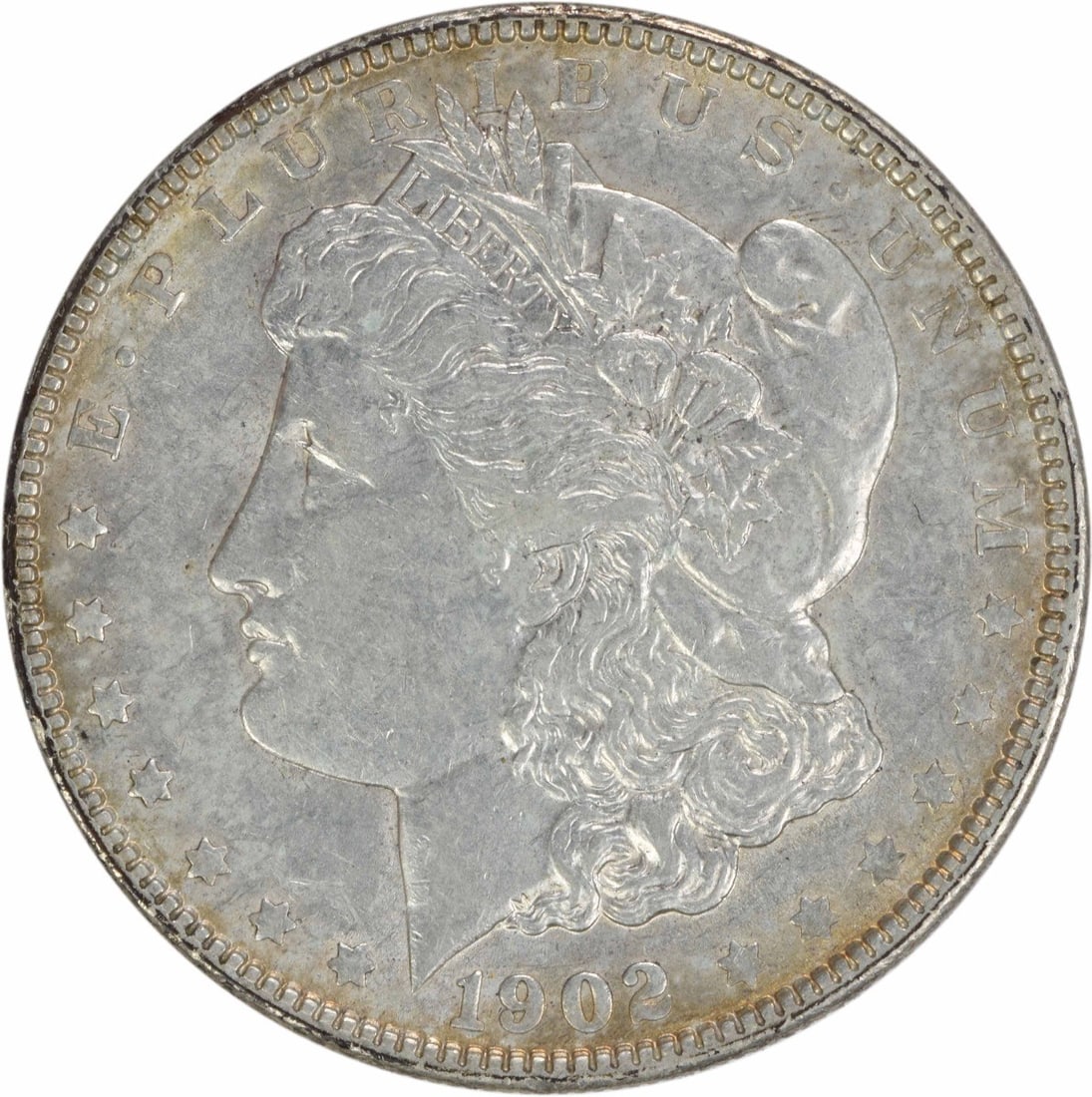 1902 Morgan Silver Dollar AU Uncertified 90% Silver Coin: 1902 Morgan Silver Dollar AU Uncertified 90% Silver Coin This 1902 Morgan Silver Dollar is an attractive addition for any coin collector. Struck in Philadelphia, this coin features 90% silver and 10% 