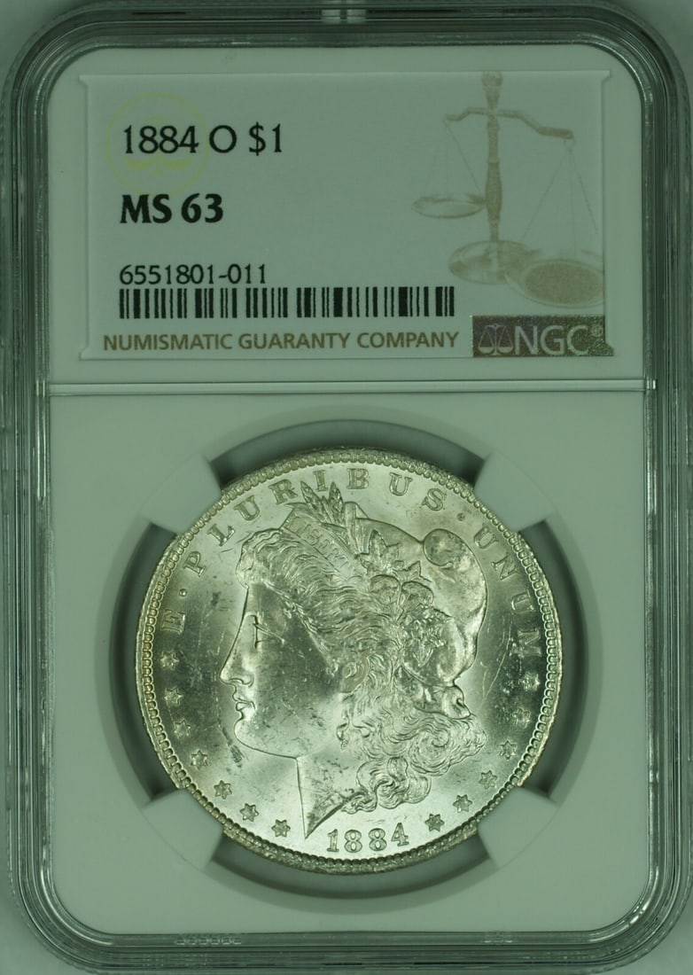 NGC MS63 1884-O Morgan Dollar Silver Coin New Orleans Light Reverse Toning: NGC MS63 1884-O Morgan Dollar Silver Coin New Orleans Light Reverse Toning This is an 1884-O Morgan Silver Dollar coin from the United States, minted in New Orleans. The coin is certified by NGC with 
