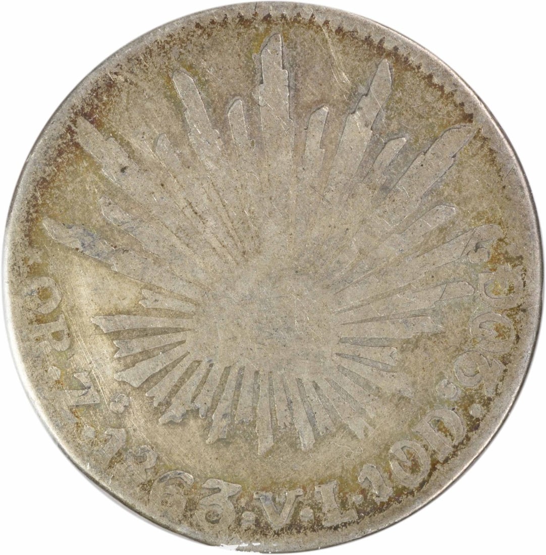 Mexico 1863 2 Reales KM374.12 F Uncertified: Mexico 1863 2 Reales KM374.12 F Uncertified This 1863 Mexico 2 Reales coin, cataloged as KM374.12, is a circulated piece from the Zs VL mint. The coin is graded as Fine (F) and is offered uncertified.