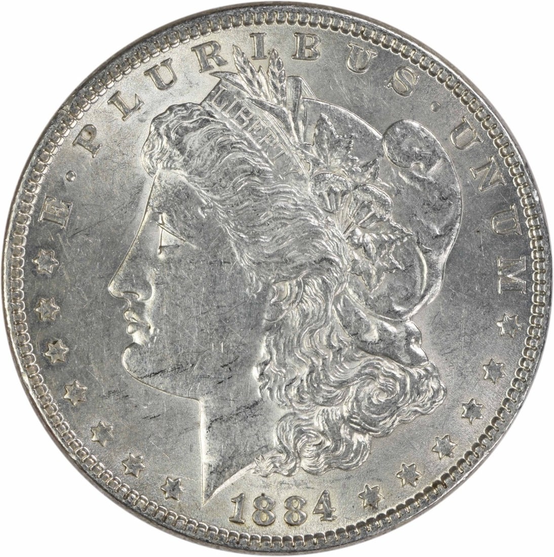 1884 Philadelphia Morgan Dollar 90% Silver AU Uncertified: 1884 Philadelphia Morgan Dollar 90% Silver AU Uncertified This 1884 Morgan Silver Dollar from the Philadelphia Mint is composed of 90% silver and 10% copper. Designed by George T. Morgan, it features 