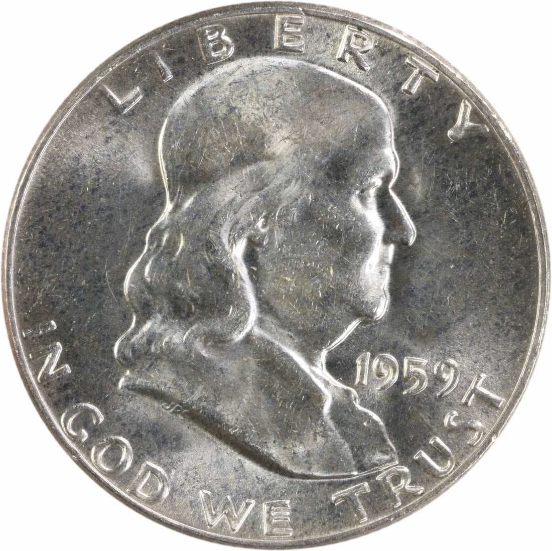 1959 Silver Franklin Half Dollar Uncirculated Uncertified Coin: 1959 Silver Franklin Half Dollar Uncirculated Uncertified Coin This is a 1959 Franklin Silver Half Dollar, featuring a brilliant uncirculated condition. The coin is uncertified, with no mint mark, and