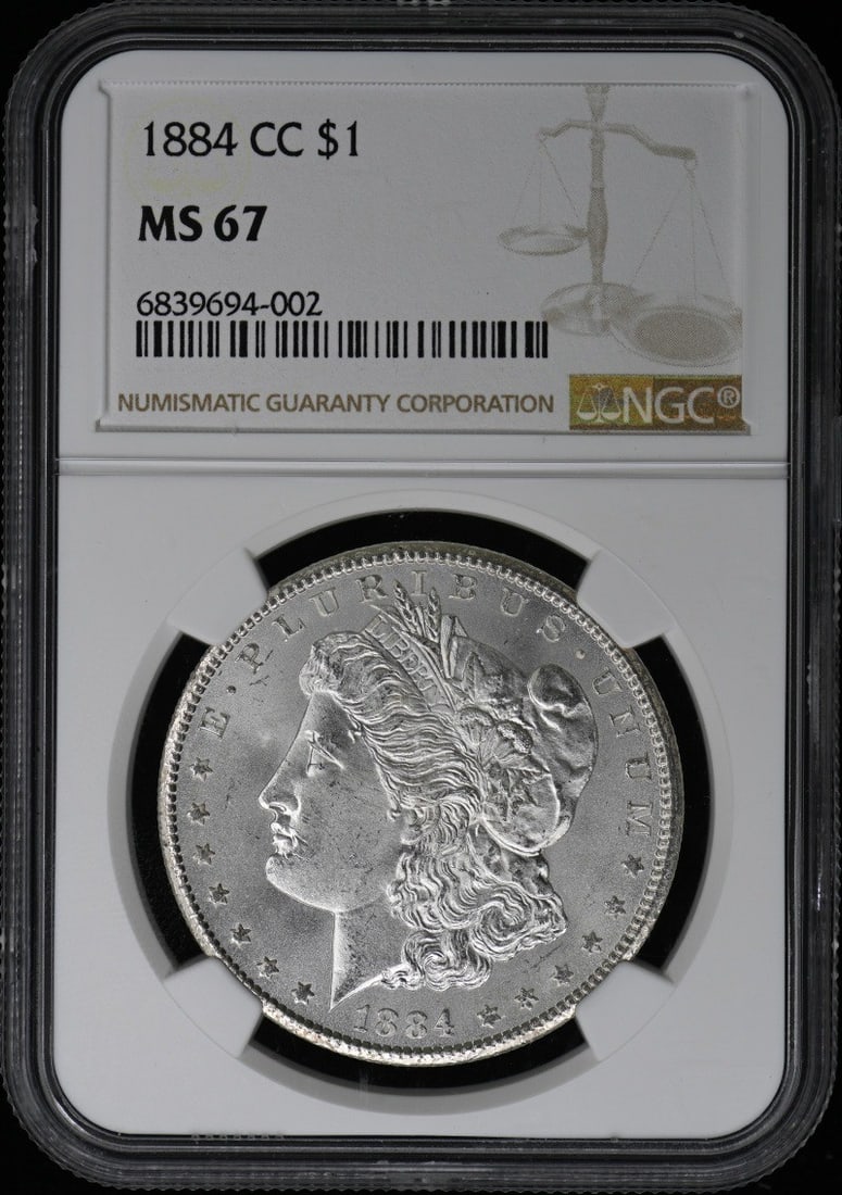 1884-CC Morgan Dollar NGC MS67 Uncirculated Coin: 1884-CC Morgan Dollar NGC MS67 Uncirculated Coin This 1884-CC Morgan Dollar is a stunning example of American coinage, certified by NGC with a remarkable MS67 grade. Struck in 1884 at the Carson City 
