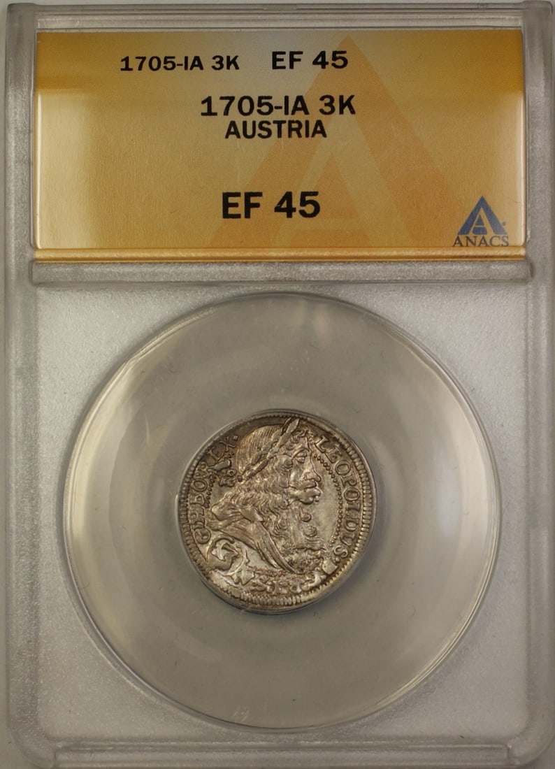 Austria 1705 Three Kreuzer Silver Coin ANACS EF 45: Austria 1705 Three Kreuzer Silver Coin ANACS EF 45 This 1705-IA Austria Three Kreuzer coin is composed of silver and features a denomination of 3 Kreuzer. It has been certified by ANACS and assigned a