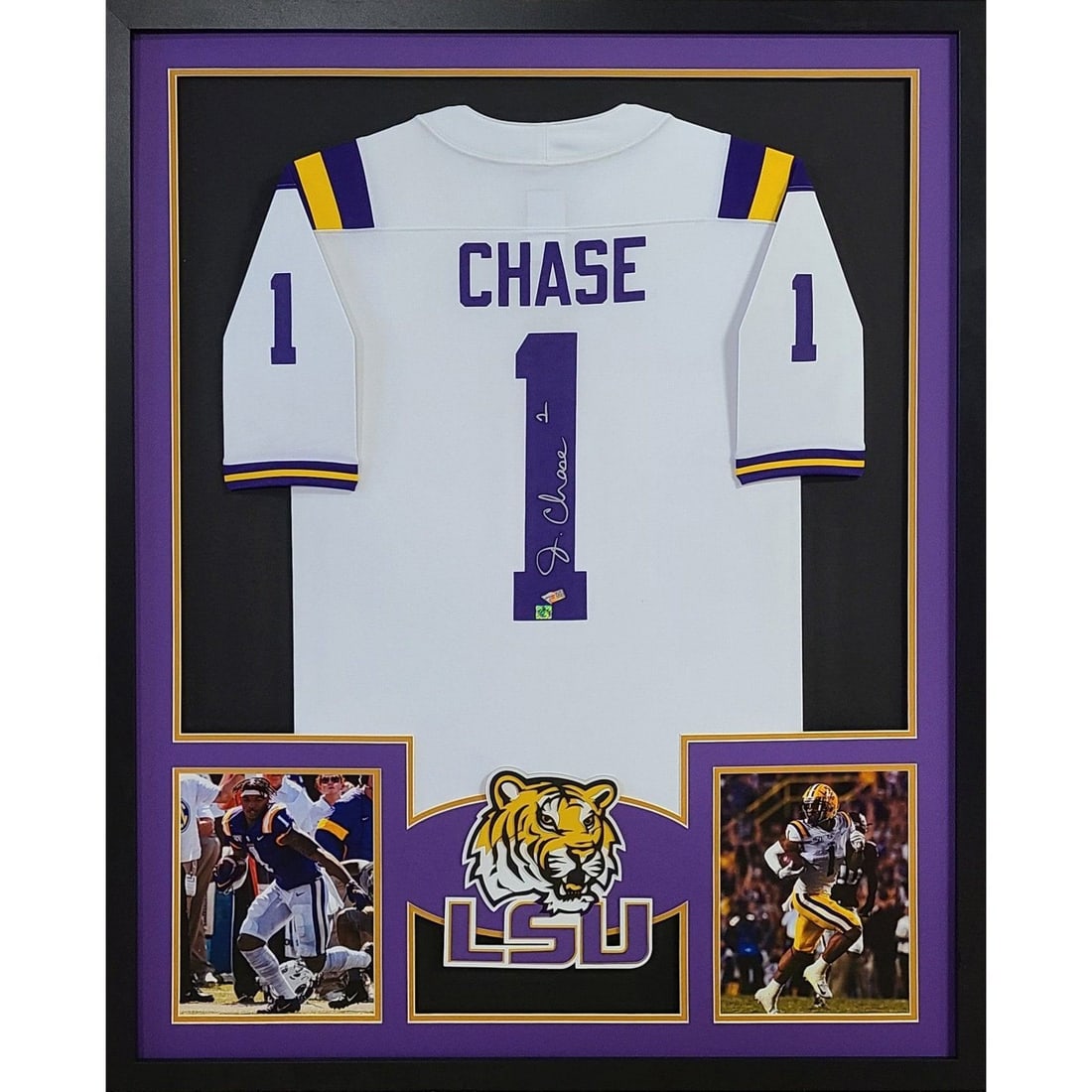 Ja'Marr Chase Autographed Framed LSU Jersey by Fanatics: Ja'Marr Chase Autographed Framed LSU Jersey by Fanatics This autographed framed jersey by Ja'Marr Chase showcases the LSU Tigers, providing a striking tribute to the talented athlete. Authenticated by