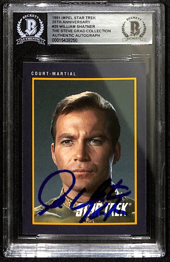 William Shatner Signed Captain Kirk 1991 Impel Star Trek Card #29 Beckett Certified: William Shatner Signed Captain Kirk 1991 Impel Star Trek Card #29 Beckett Certified This is a signed 1991 Impel Star Trek 25th Anniversary trading card featuring Captain Kirk, portrayed by William Sha