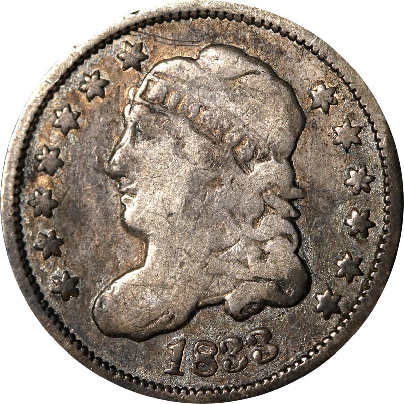 1833 United States Silver Bust Half Dime Coin: 1833 United States Silver Bust Half Dime Coin This is an 1833 Bust Half Dime from the United States, composed of silver with a fineness of 0.9. The coin is circulated and is offered in pre-owned condi