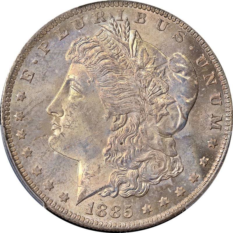 MS63 1885-O Morgan Dollar PCGS Certified Silver with Toned Reverse: MS63 1885-O Morgan Dollar PCGS Certified Silver with Toned Reverse This 1885-O Morgan Silver Dollar is certified by PCGS with a grade of MS63. The coin features attractive toning and a white reverse. 
