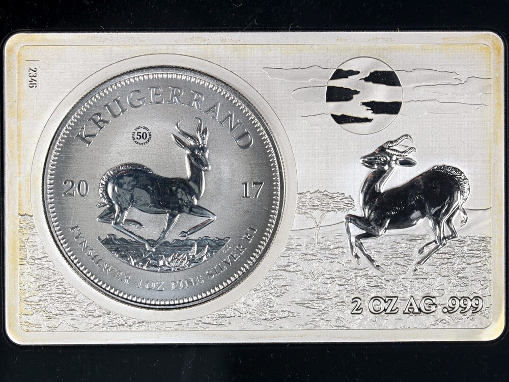 2017 South Africa Krugerrand 50th Anniversary Silver Coin and 2 oz Bar Set: 2017 South Africa Krugerrand 50th Anniversary Silver Coin and 2 oz Bar Set This set commemorates the 50th Anniversary of the Krugerrand and includes a 2017 South Africa Reverse Proof Silver Coin paire