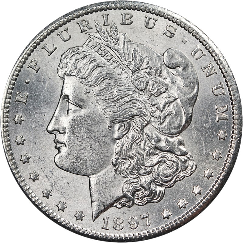 1897-S Morgan Dollar Bright White BU+: 1897-S Morgan Dollar Bright White BU+ This 1897-S Morgan Silver Dollar is an uncirculated coin with brilliant luster, strong strike, and attractive surfaces. It features bright white color and is note