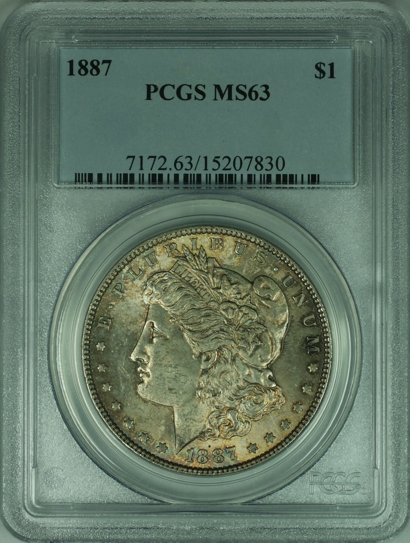 PCGS MS63 1887 Morgan silver dollar toned: PCGS MS63 1887 Morgan silver dollar toned This is an 1887 Morgan Silver Dollar coin from the United States, graded MS63 by PCGS. The coin is composed of silver, features attractive toning, and was min