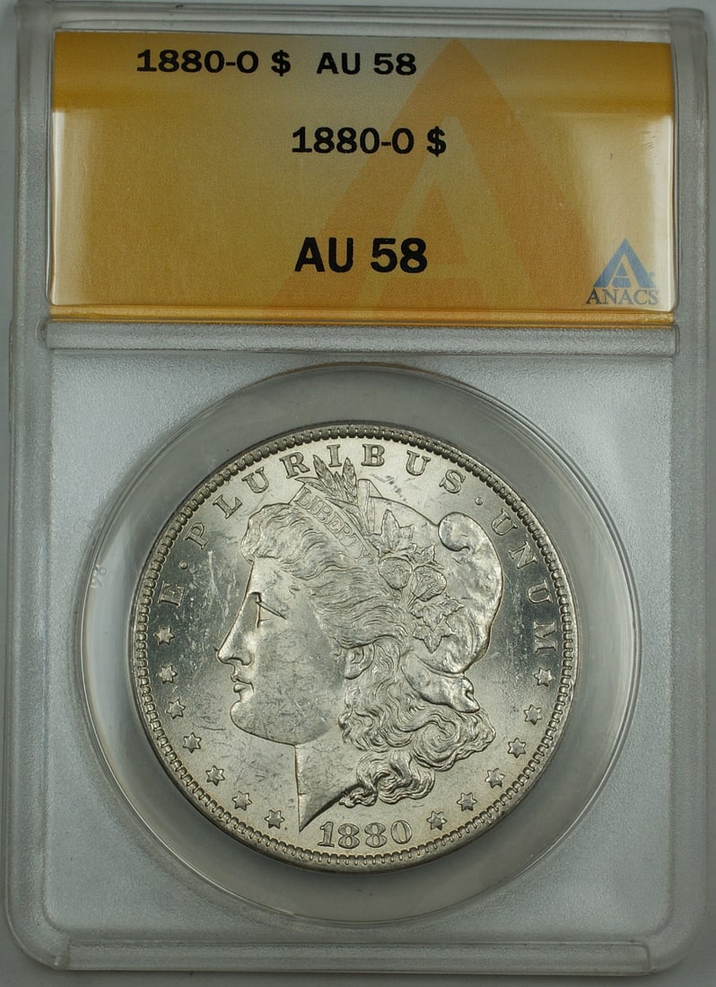 ANACS AU-58 1880-O Morgan Dollar Silver Coin New Orleans Mint: ANACS AU-58 1880-O Morgan Dollar Silver Coin New Orleans Mint This 1880-O Morgan Silver Dollar is a $1 coin certified by ANACS with a grade of AU-58. Minted in New Orleans in 1880, it features a silve