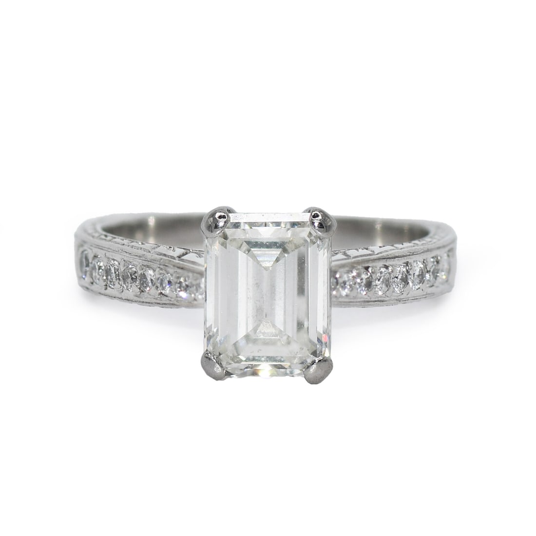 EGL Certified Platinum Emerald Diamond Engagement Ring Size 5: EGL Certified Platinum Emerald Diamond Engagement Ring Size 5 This platinum ladies' diamond engagement ring features an emerald-cut natural diamond weighing 1.59 carats, graded I color and VS1 clarity