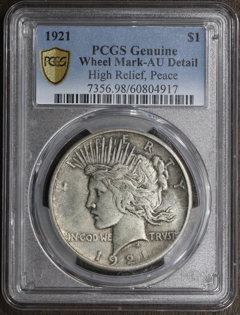 PCGS 1921 High Relief Peace Dollar Silver $1: PCGS 1921 High Relief Peace Dollar Silver $1 This 1921 High Relief Peace Dollar features a silver composition with a fineness of 0.9. Minted in Philadelphia, it represents the inaugural year of the Pe