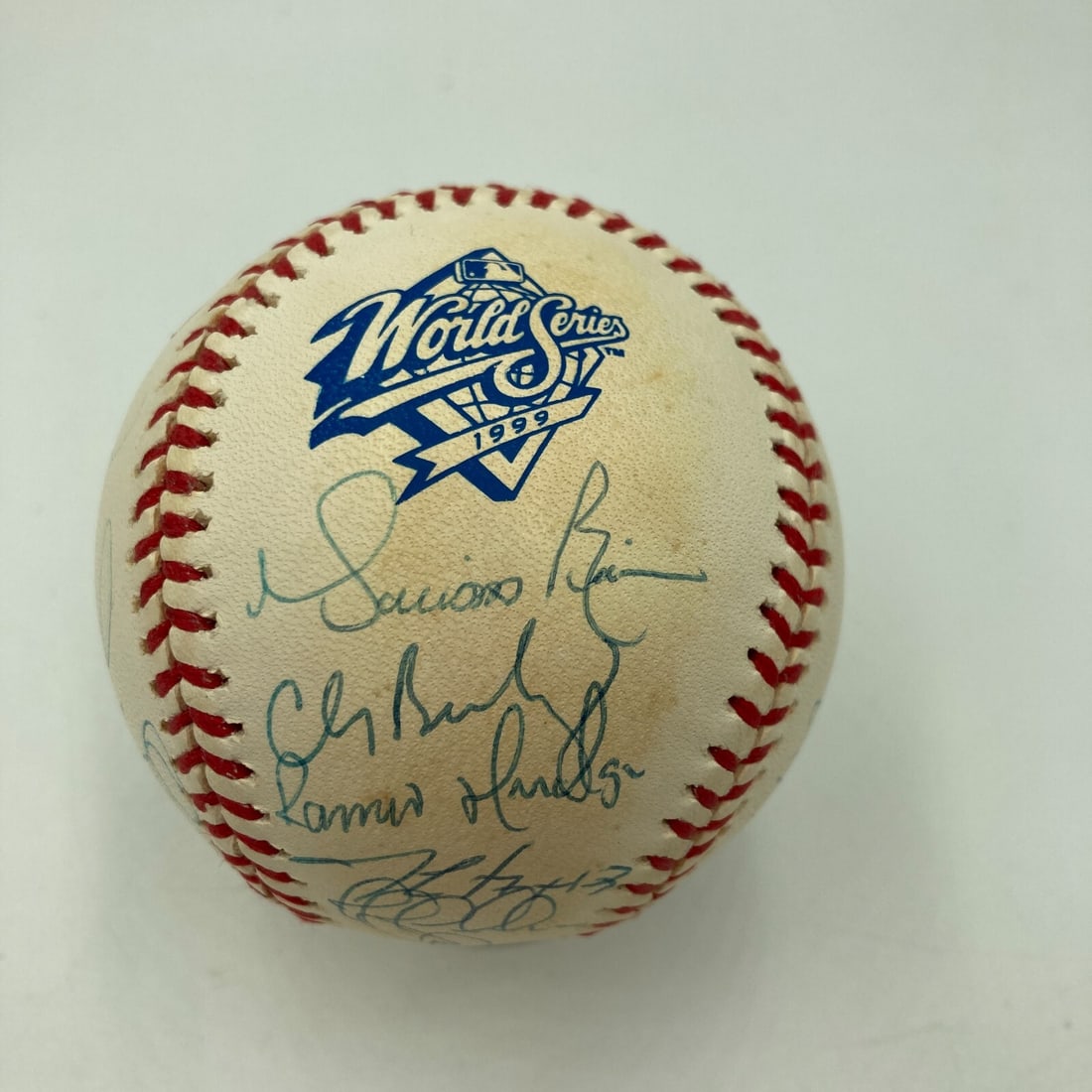 1999 NY Yankees Team Signed Baseball with Jeter Rivera COA: 1999 NY Yankees Team Signed Baseball with Jeter Rivera COA Celebrate the legacy of the 1999 New York Yankees with this authentic team-signed baseball. This item features eighteen blue-ink signatures f