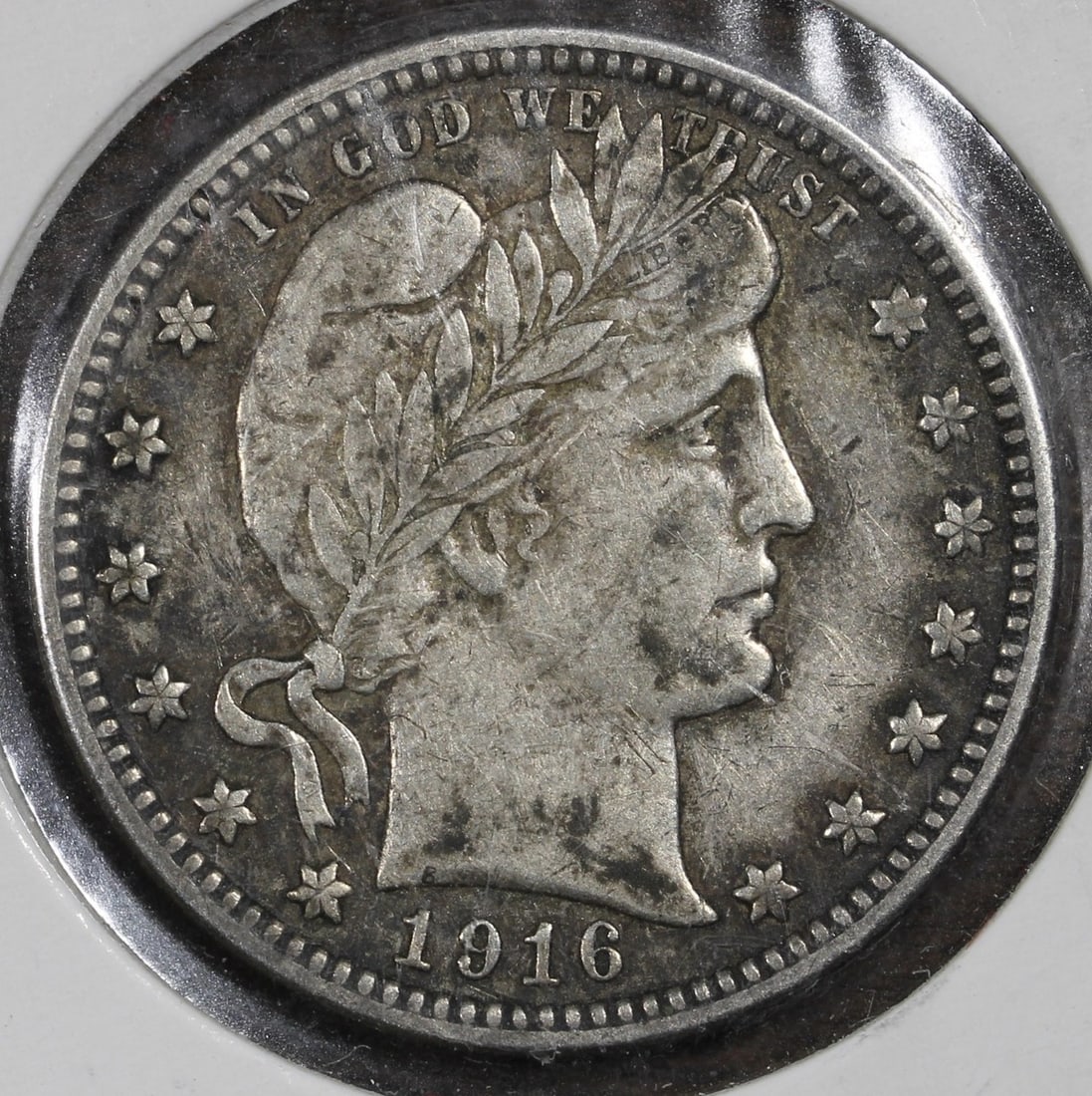 1916-D Denver Barber Silver Quarter XF: 1916-D Denver Barber Silver Quarter XF This 1916-D Barber Quarter is a circulated silver coin from the last year of the Barber series. Struck at the Denver Mint, it is composed of 90% silver and remai