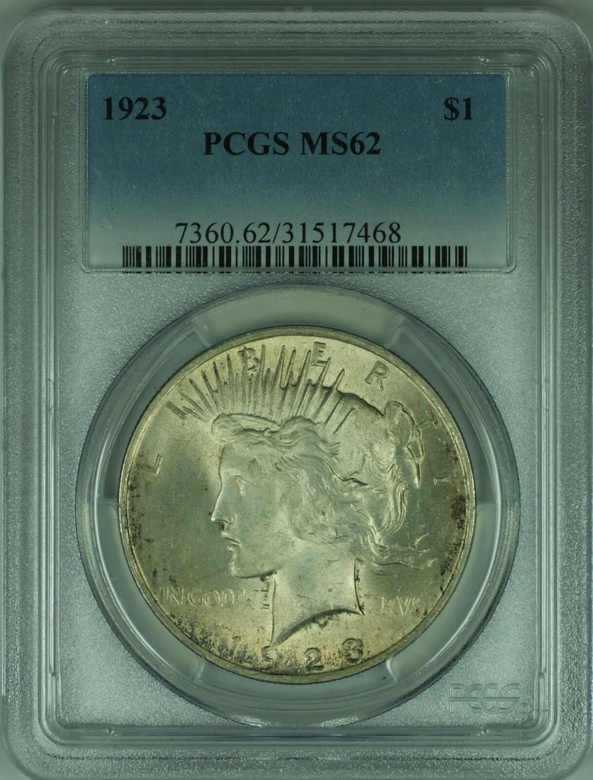 PCGS MS-62 1923 Peace Silver Dollar Philadelphia Toned Uncirculated $1 Coin: PCGS MS-62 1923 Peace Silver Dollar Philadelphia Toned Uncirculated $1 Coin This is a 1923 Peace Silver Dollar from the United States, graded MS-62 by PCGS. The coin was minted in Philadelphia, is unc