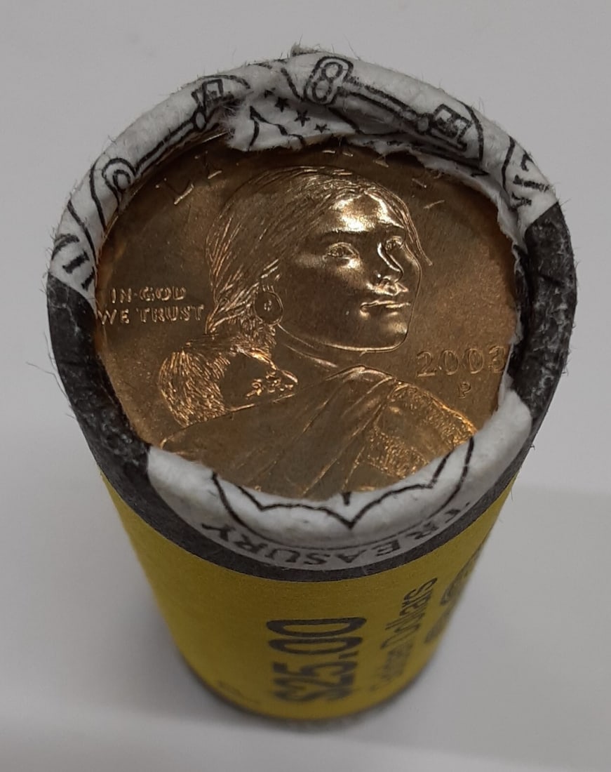 25 Coin Roll 2003-P Sacagawea Native American Dollar Mint Wrapper: 25 Coin Roll 2003-P Sacagawea Native American Dollar Mint Wrapper This listing features a roll of 25 uncirculated 2003-P Sacagawea Native American $1 coins from the Philadelphia Mint. Each coin is com