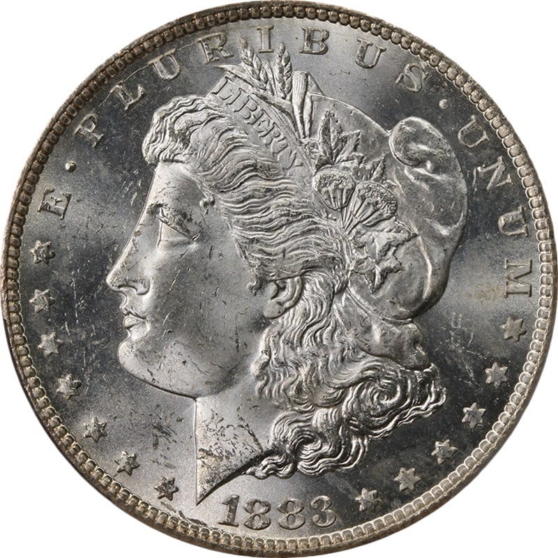 PCGS MS64 1883-CC Morgan Dollar Silver: PCGS MS64 1883-CC Morgan Dollar Silver This 1883-CC Morgan Silver Dollar is graded MS64 by PCGS, indicating a high-quality uncirculated coin with excellent luster, strong strike, and appealing surface
