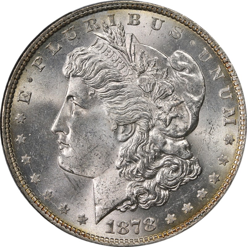 PCGS MS63 1878-P 8TF Morgan Silver Dollar: PCGS MS63 1878-P 8TF Morgan Silver Dollar This 1878-P 8 Tail Feathers Morgan Silver Dollar is graded MS63 by PCGS. Struck in silver with a fineness of 0.9, this uncirculated coin features excellent lu