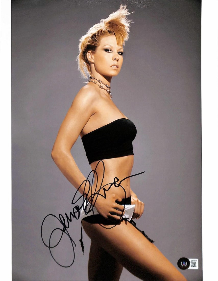 Beckett Certified Jenna Elfman 11x14 Autographed Photo: Beckett Certified Jenna Elfman 11x14 Autographed Photo This 11x14 glossy photograph features a bold and stylish image of actress Jenna Elfman, personally hand-signed by her in black ink. The autograph