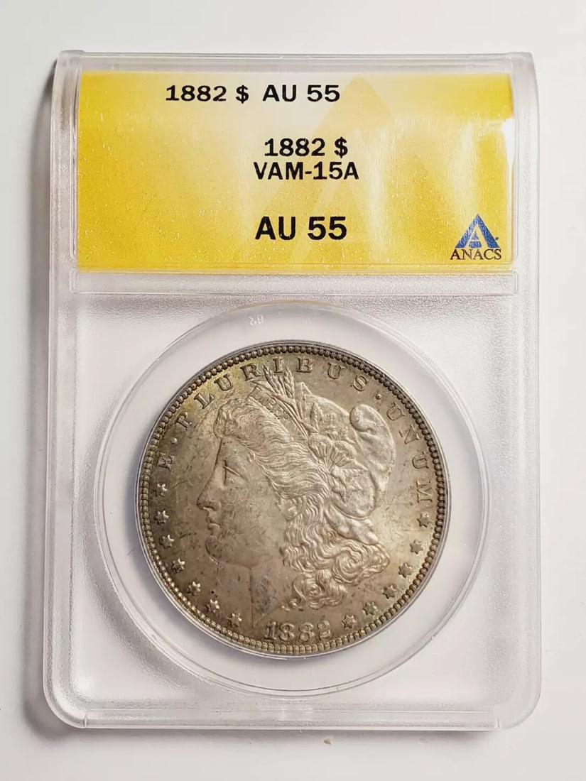 1882 P Morgan Dollar Silver Certified ANACS AU 55 VAM 15A: 1882 P Morgan Dollar Silver Certified ANACS AU 55 VAM 15A This 1882 P Morgan Dollar is certified by ANACS with a grade of AU 55, indicating its well-preserved quality despite being circulated. Struck 