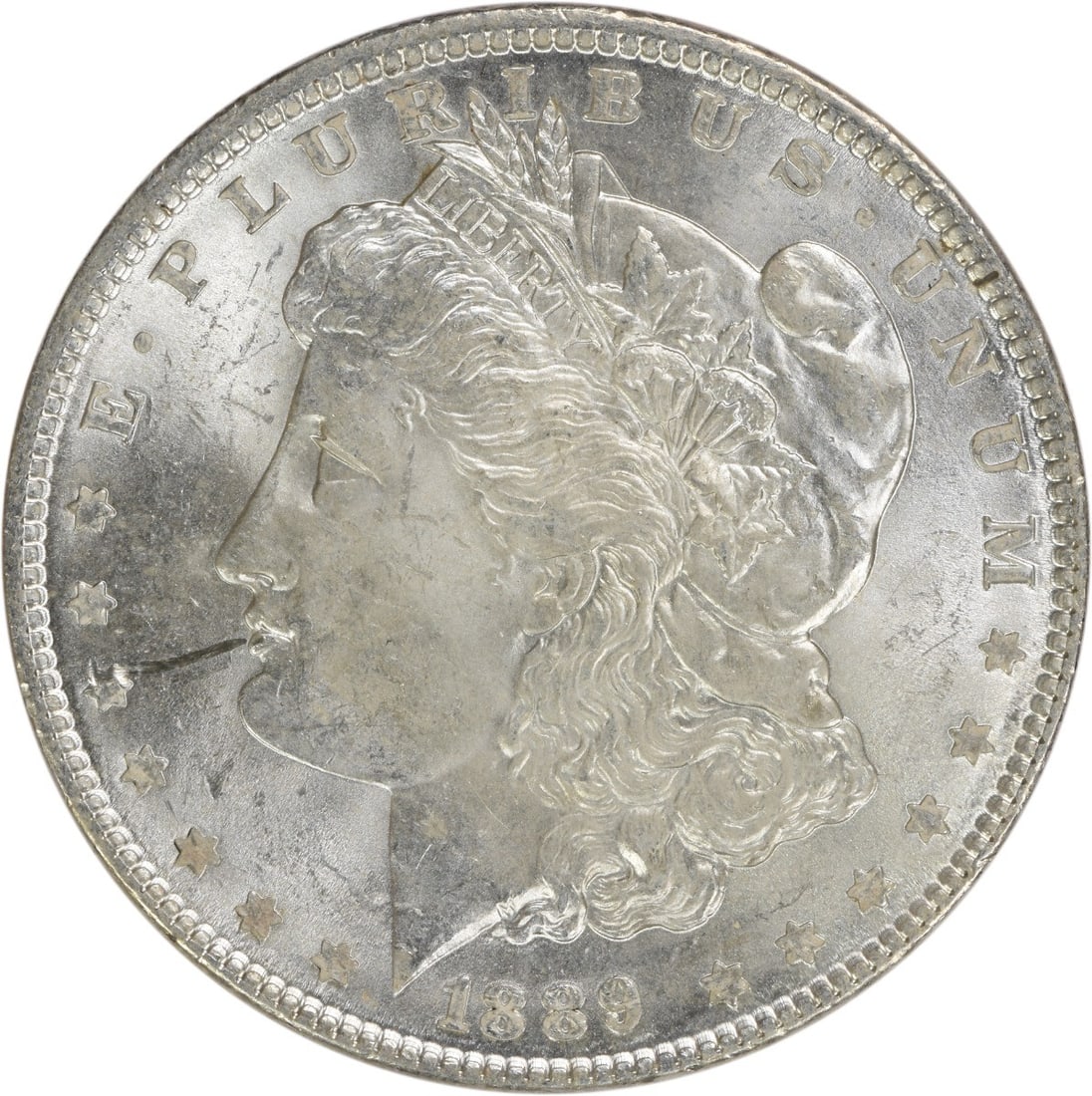 Brilliant Uncirculated 1889 Silver Morgan Dollar Coin Uncertified No Mint Mark: Brilliant Uncirculated 1889 Silver Morgan Dollar Coin Uncertified No Mint Mark This 1889 Morgan Silver Dollar is an uncirculated coin featuring brilliant uncirculated (BU) quality. Composed of silver,