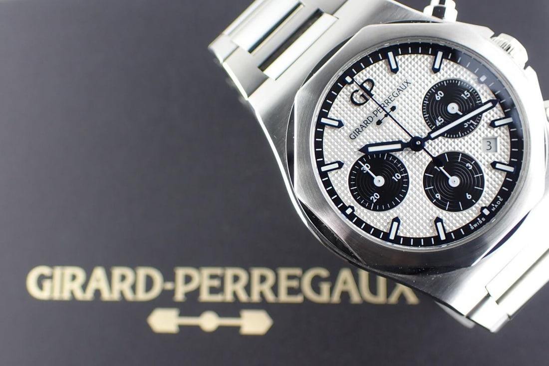 Girard Perregaux Laureato 42mm Chronograph Men's Wristwatch: Girard Perregaux Laureato 42mm Chronograph Men's Wristwatch This Girard Perregaux Laureato Chronograph 42mm men's wristwatch showcases the brand's renowned craftsmanship and iconic design. Featuring a