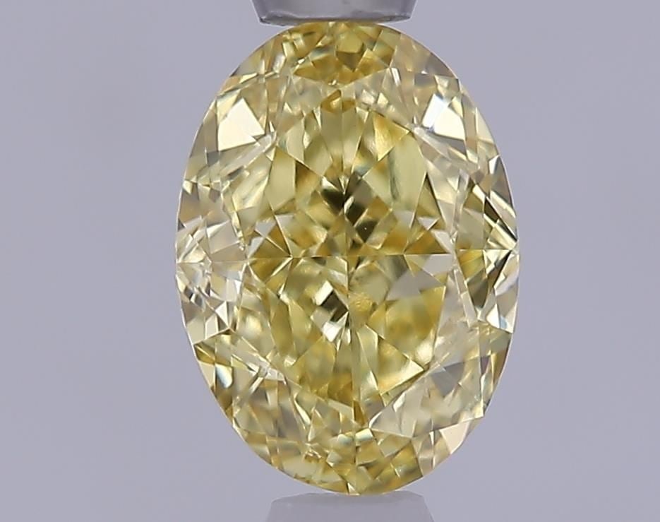 Loose Diamond - OVAL 1.02ct Fancy Intense Yellow VS1: Loose Diamond - OVAL 1.02ct Fancy Intense Yellow VS1 Source: This is a real non-mined Diamond that has been grown in a lab Shape: OVAL Carats: 1.02 Color: Fancy Intense Yellow Certification: IGI Video