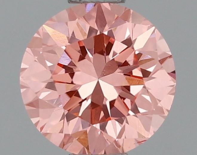 Loose Diamond - ROUND 0.83ct Fancy Vivid Pink VS2: Loose Diamond - ROUND 0.83ct Fancy Vivid Pink VS2 Source: This is a real non-mined Diamond that has been grown in a lab Shape: ROUND Carats: 0.83 Color: Fancy Vivid Pink Certification: IGI Video: