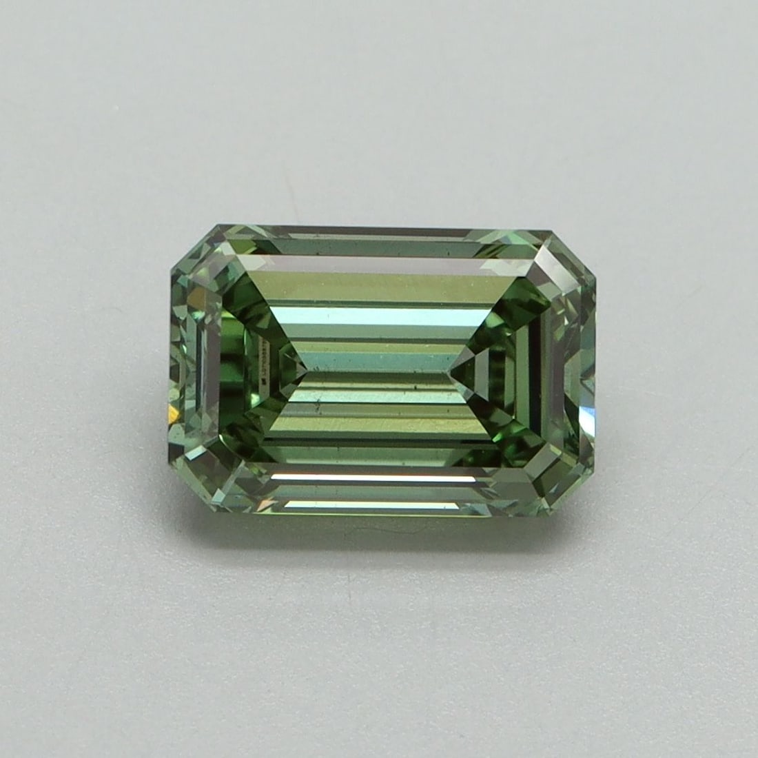 Loose Diamond - EMERALD 1.83ct Fancy Vivid Green VS2: Loose Diamond - EMERALD 1.83ct Fancy Vivid Green VS2 Source: This is a real non-mined Diamond that has been grown in a lab Shape: EMERALD Carats: 1.83 Color: Fancy Vivid Green Certification: IGI