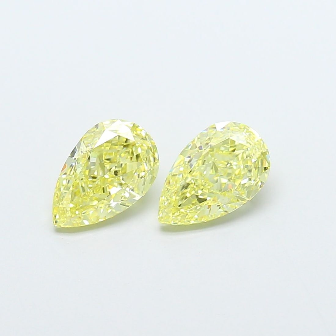Loose Diamond - PEAR 1.03ct Fancy Intense Yellow VVS2: Loose Diamond - PEAR 1.03ct Fancy Intense Yellow VVS2 Source: This is a real non-mined Diamond that has been grown in a lab Shape: PEAR Carats: 1.03 Color: Fancy Intense Yellow Certification: IGI Vide