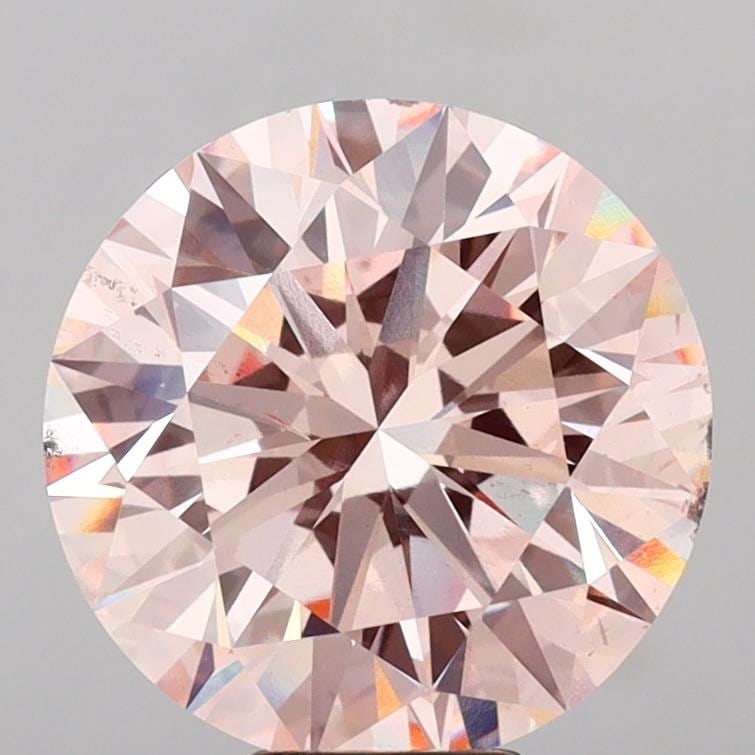 Ideal Loose Diamond - ROUND 10.04ct Fancy Pink VS2: Ideal Loose Diamond - ROUND 10.04ct Fancy Pink VS2 Source: This is a real non-mined Diamond that has been grown in a lab Shape: ROUND Carats: 10.04 Color: Fancy Pink Certification: IGI Video: