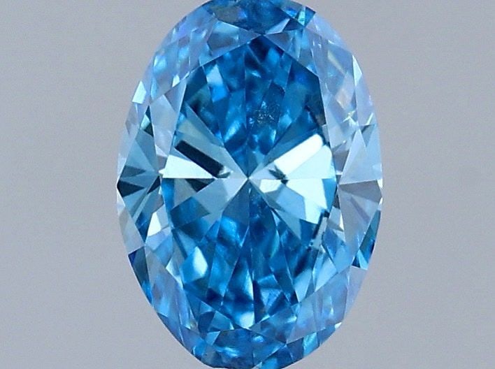 Loose Diamond - OVAL 0.28ct Fancy Vivid Blue VS2: Loose Diamond - OVAL 0.28ct Fancy Vivid Blue VS2 Source: This is a real non-mined Diamond that has been grown in a lab Shape: OVAL Carats: 0.28 Color: Fancy Vivid Blue Certification: IGI Video: