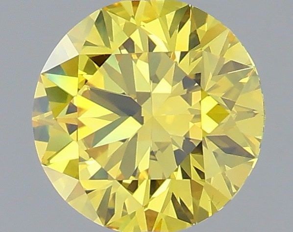 Ideal Loose Diamond - ROUND 0.95ct Fancy Vivid Yellow VS1: Ideal Loose Diamond - ROUND 0.95ct Fancy Vivid Yellow VS1 Source: This is a real non-mined Diamond that has been grown in a lab Shape: ROUND Carats: 0.95 Color: Fancy Vivid Yellow Certification: IGI V