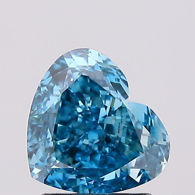 Loose Diamond - HEART 1.56ct Fancy Vivid Blue VS1: Loose Diamond - HEART 1.56ct Fancy Vivid Blue VS1 Source: This is a real non-mined Diamond that has been grown in a lab Shape: HEART Carats: 1.56 Color: Fancy Vivid Blue Certification: IGI Video: