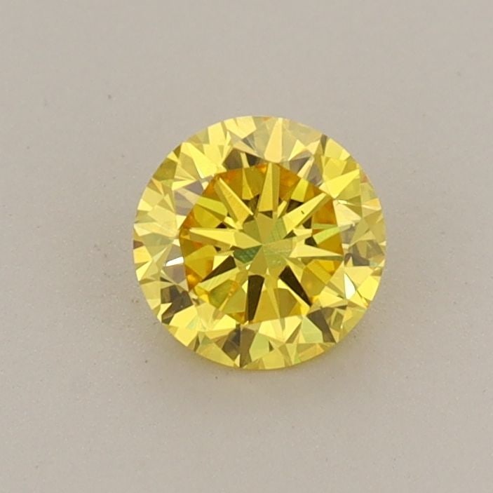 Loose Diamond - ROUND 0.45ct Fancy Vivid Yellow VVS2: Loose Diamond - ROUND 0.45ct Fancy Vivid Yellow VVS2 Source: This is a real non-mined Diamond that has been grown in a lab Shape: ROUND Carats: 0.45 Color: Fancy Vivid Yellow Certification: IGI Video: