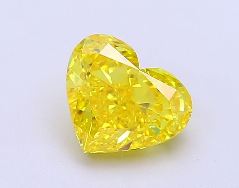 Loose Diamond - HEART 1.55ct Fancy Vivid Yellow VS1: Loose Diamond - HEART 1.55ct Fancy Vivid Yellow VS1 Source: This is a real non-mined Diamond that has been grown in a lab Shape: HEART Carats: 1.55 Color: Fancy Vivid Yellow Certification: IGI Video: