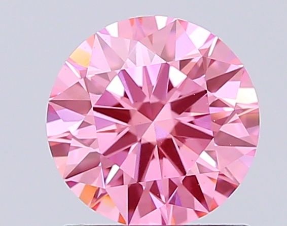 Ideal Loose Diamond - ROUND 1.1ct Fancy Vivid Pink VS2: Ideal Loose Diamond - ROUND 1.1ct Fancy Vivid Pink VS2 Source: This is a real non-mined Diamond that has been grown in a lab Shape: ROUND Carats: 1.1 Color: Fancy Vivid Pink Certification: IGI Video: