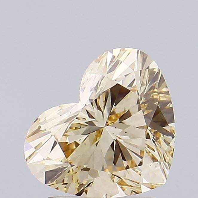 Loose Diamond - HEART 1.57ct Fancy Yellow VS2: Loose Diamond - HEART 1.57ct Fancy Yellow VS2 Source: This is a real non-mined Diamond that has been grown in a lab Shape: HEART Carats: 1.57 Color: Fancy Yellow Certification: IGI Video: