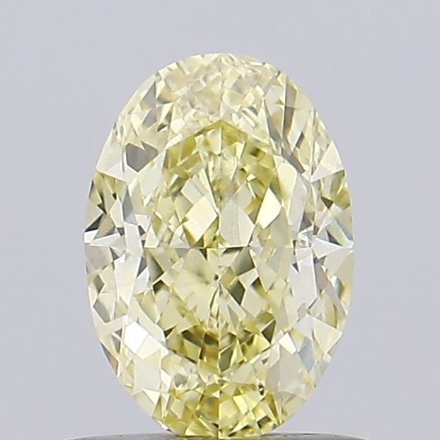 Loose Diamond - OVAL 1.0ct Fancy Yellow VS1: Loose Diamond - OVAL 1.0ct Fancy Yellow VS1 Source: This is a real non-mined Diamond that has been grown in a lab Shape: OVAL Carats: 1.0 Color: Fancy Yellow Certification: IGI Video: