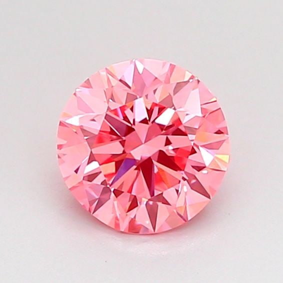 Loose Diamond - ROUND 0.75ct Fancy Vivid Pink VVS2: Loose Diamond - ROUND 0.75ct Fancy Vivid Pink VVS2 Source: This is a real non-mined Diamond that has been grown in a lab Shape: ROUND Carats: 0.75 Color: Fancy Vivid Pink Certification: IGI Video: