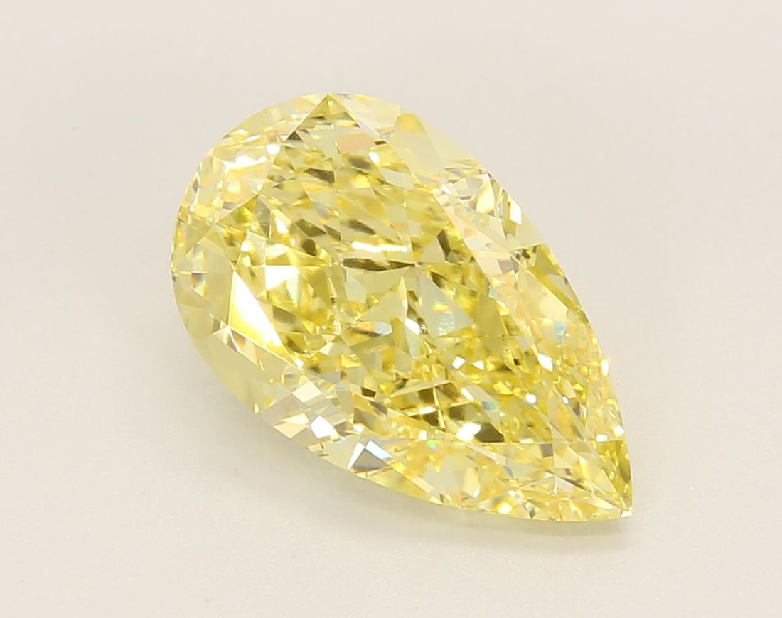 Loose Diamond - PEAR 4.37ct Fancy Vivid Yellow VS1: Loose Diamond - PEAR 4.37ct Fancy Vivid Yellow VS1 Source: This is a real non-mined Diamond that has been grown in a lab Shape: PEAR Carats: 4.37 Color: Fancy Vivid Yellow Certification: IGI Video: