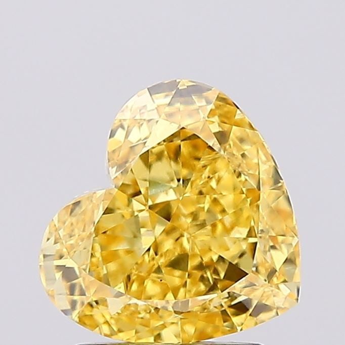 Loose Diamond - HEART 1.75ct Fancy Vivid Yellow VS1: Loose Diamond - HEART 1.75ct Fancy Vivid Yellow VS1 Source: This is a real non-mined Diamond that has been grown in a lab Shape: HEART Carats: 1.75 Color: Fancy Vivid Yellow Certification: IGI Video: