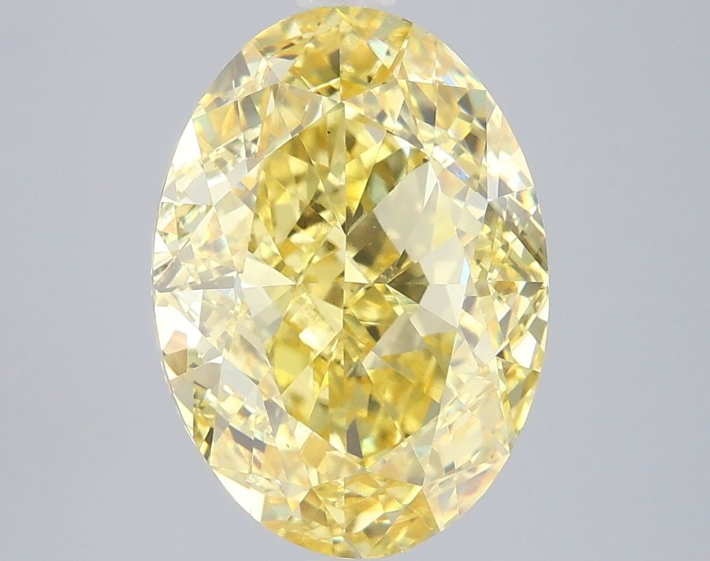 Loose Diamond - OVAL 5.03ct Fancy Vivid Yellow VS1: Loose Diamond - OVAL 5.03ct Fancy Vivid Yellow VS1 Source: This is a real non-mined Diamond that has been grown in a lab Shape: OVAL Carats: 5.03 Color: Fancy Vivid Yellow Certification: IGI Video: