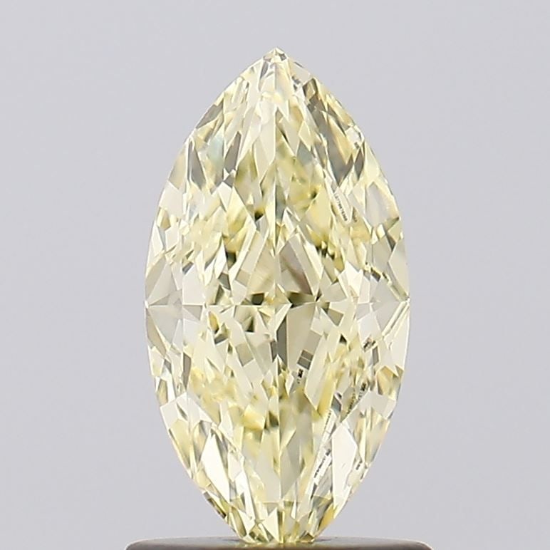 Loose Diamond - MARQUISE 1.22ct Fancy Light Yellow VVS2: Loose Diamond - MARQUISE 1.22ct Fancy Light Yellow VVS2 Source: This is a real non-mined Diamond that has been grown in a lab Shape: MARQUISE Carats: 1.22 Color: Fancy Light Yellow Certification: IGI 