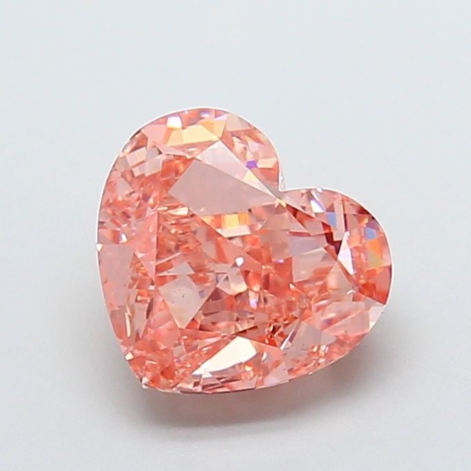 Loose Diamond - HEART 3.2ct Fancy Vivid Brownish Pink VS1: Loose Diamond - HEART 3.2ct Fancy Vivid Brownish Pink VS1 Source: This is a real non-mined Diamond that has been grown in a lab Shape: HEART Carats: 3.2 Color: Fancy Vivid Brownish Pink Certification:
