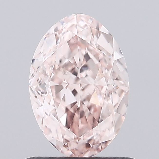 Loose Diamond - OVAL 1.01ct Fancy Pink VS2: Loose Diamond - OVAL 1.01ct Fancy Pink VS2 Source: This is a real non-mined Diamond that has been grown in a lab Shape: OVAL Carats: 1.01 Color: Fancy Pink Certification: IGI Video: